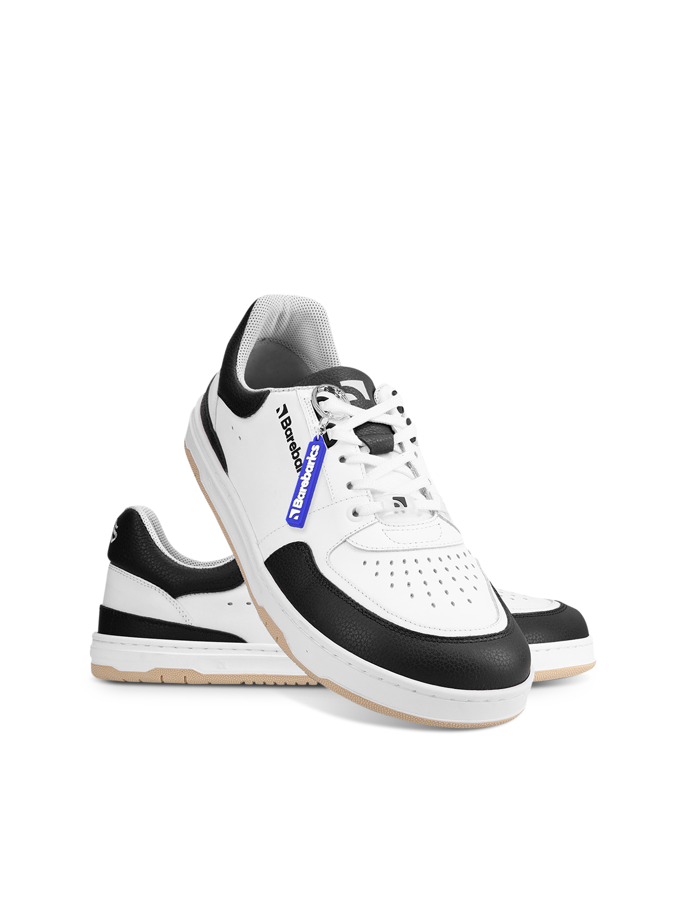 Barefoot Sneakers Barebarics Wave - White & Black.
La tomaia è di pelle nappa liscia di qualità.
Attributi Barefoot
Forma anatomica – le sneakers rispettano la forma dei piedi.
Più informazioni:
calzatura da cittàdesign urbano modernoprogettate e prodotte a mano in UE da materiali locali e sostenibiliottima resistenza e costanza dei colori dei materialitecnologia Dermodry Coolmax® per un continuo drenaggio dell’umiditàdisponibili nelle taglie: 36-47 (secondo le misure europee)EAN/SKU: %eanorsku%