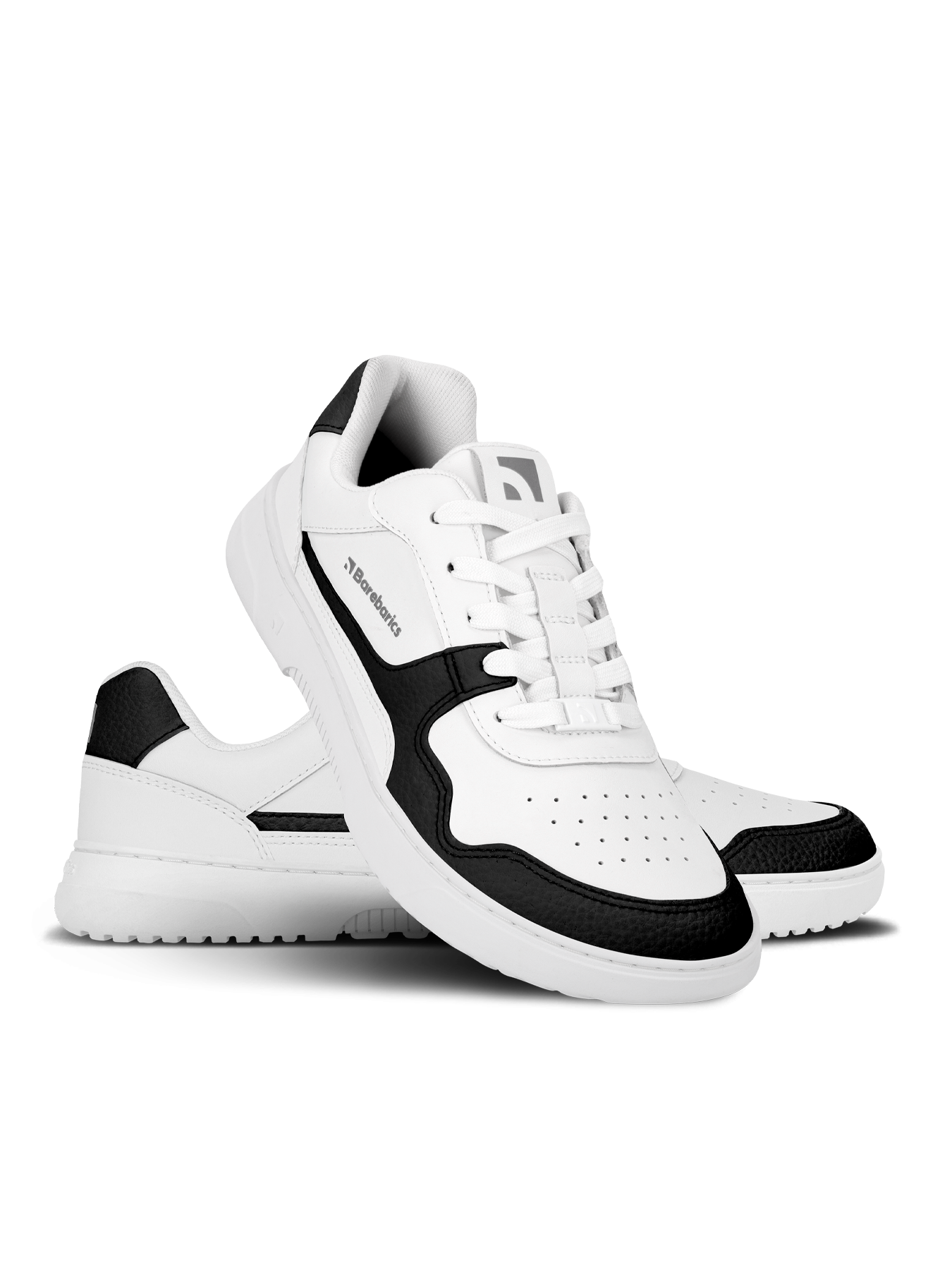 Barefoot Sneakers Barebarics Zing - White & Black - Leather.
Tomaia: pelleFodera: tessutoSoletta: PU + poliestere (rimovibile - antibatterica)Suola: ComfortGrip Neo (gomma)Produzione: Vietnam
Caratteristiche
    Modello unisex popolare disponibile in nuove combinazioni di colori.
Vantaggi delle scarpe barefoot
    Suola ultra flessibile.